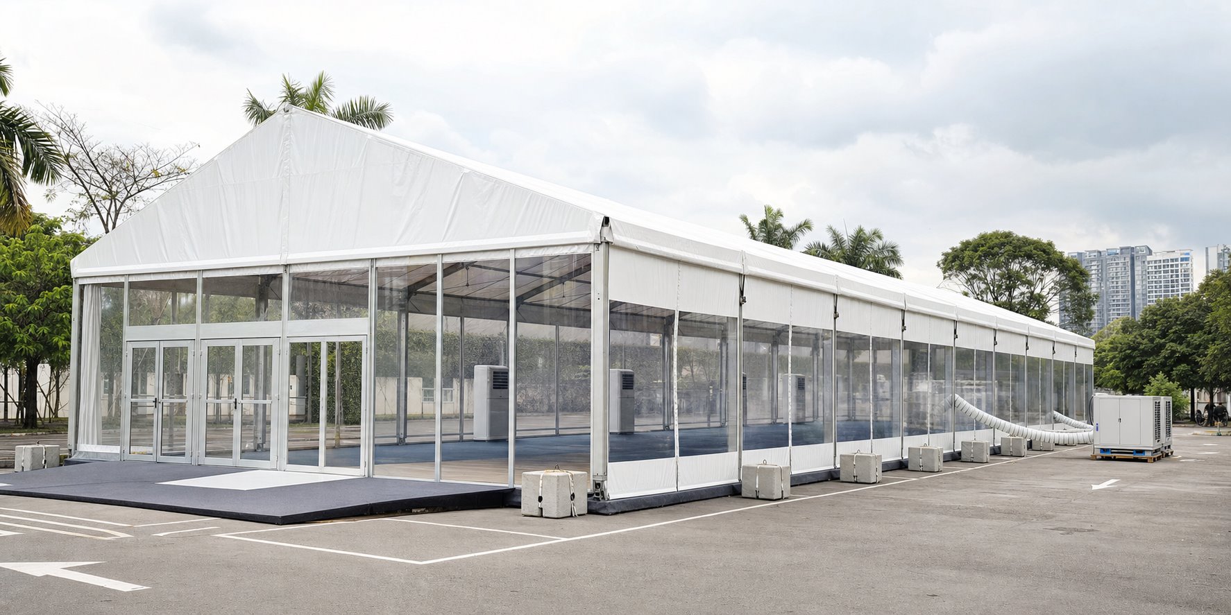 Corporate marquee event setup with covered guest space, seating layout and outdoor event support