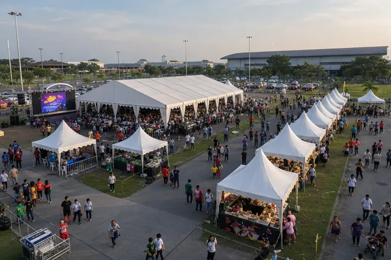 MAEPS Serdang festival setup with central marquee, modular canopy rows, food booths, stage support and open ground guest lanes